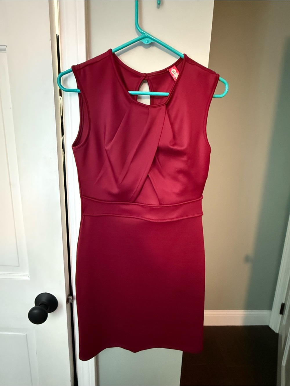 Sleeveless Pleated Front Sheath Dress in Deep Wine